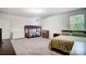 Bright bedroom featuring bunk beds, a queen-sized bed, and neutral decor with ample space for furniture at 1150 Hearth Sw Ln, Concord, NC 28025