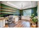 Bright home office with floating shelves, white trim, natural light, and dedicated workspace at 1150 Hearth Sw Ln, Concord, NC 28025
