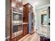 Well-equipped kitchen featuring stainless steel appliances, granite countertops, and ample cabinet space for storage at 1150 Hearth Sw Ln, Concord, NC 28025