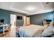 Comfortable main bedroom with tray ceiling, walk-in closet and ensuite bathroom offering plenty of space at 1150 Hearth Sw Ln, Concord, NC 28025