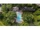 Aerial view of community pool surrounded by lush trees in a Mooresville neighborhood at 117 Fellspoint Rd, Mooresville, NC 28115