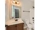 This bathroom has a single sink vanity, a large mirror, and a shower-tub combo at 117 Fellspoint Rd, Mooresville, NC 28115