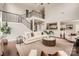 Spacious living room with soaring ceilings, a cozy seating area, and a view of the open floor plan at 117 Fellspoint Rd, Mooresville, NC 28115