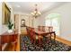 Elegant dining room featuring a beautiful rug and a large window at 1209 S South St, Gastonia, NC 28052
