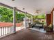 Inviting outdoor patio with a gazebo and lush landscaping, perfect for relaxation and entertaining at 1209 S South St, Gastonia, NC 28052