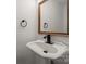 Half bath features a pedestal sink, and bronze faucet at 135 Mcshag Dr, Kannapolis, NC 28081