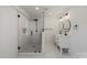 Newly remodeled bathroom with glass shower and double sink vanity at 135 Mcshag Dr, Kannapolis, NC 28081