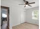 A light and airy bedroom with wooden floors and a closet at 135 Mcshag Dr, Kannapolis, NC 28081