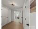 Bright hallway with fresh paint, doors and stylish ceiling light fixture at 135 Mcshag Dr, Kannapolis, NC 28081