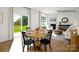 An open living space includes a dining area, living room, and access to a beautiful backyard at 138 Meadow View Dr, Statesville, NC 28677