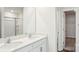 Elegant bathroom featuring a double sink vanity and a glass-enclosed shower at 140 Meadow View Dr, Statesville, NC 28677
