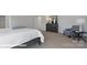 This spacious main bedroom has neutral decor and a seating area at 140 Meadow View Dr, Statesville, NC 28677