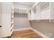 Spacious closet with hardwood flooring and shelving system at 14119 Shelburne Village Dr, Charlotte, NC 28278