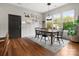 Bright dining area with large windows, hardwood floors, and stylish decor, great for Gathering gatherings at 1515 Millbridge Pkwy, Waxhaw, NC 28173