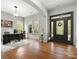 Bright office space with hardwood floors, a large front door and a view of the front yard at 1515 Millbridge Pkwy, Waxhaw, NC 28173