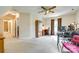 Bedroom or office featuring ceiling fan, natural light from one window and furniture at 15306 Gower Ct, Charlotte, NC 28278