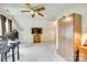 Bedroom or office featuring ceiling fan, natural light from one window and furniture at 15306 Gower Ct, Charlotte, NC 28278