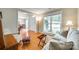 Inviting living room with hardwood floors, neutral paint, lots of light, and doorway at 15306 Gower Ct, Charlotte, NC 28278