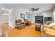 Comfortable living room featuring a fireplace and hardwood floors at 15306 Gower Ct, Charlotte, NC 28278