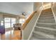 Carpeted staircase leading to the upper level of the home at 15306 Gower Ct, Charlotte, NC 28278