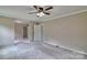 A spacious bedroom with neutral walls and a ceiling fan at 1774 Wintertide Rd, Jefferson, SC 29718