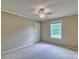 A bedroom with neutral walls, ceiling fan and natural light at 1774 Wintertide Rd, Jefferson, SC 29718