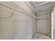 Walk-in closet with metal racks, offering ample storage space in a well-lit room at 1774 Wintertide Rd, Jefferson, SC 29718