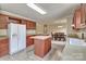Spacious eat-in kitchen features stainless steel appliances and center island at 1774 Wintertide Rd, Jefferson, SC 29718