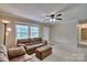 Cozy living room with plush sofas and natural light at 1774 Wintertide Rd, Jefferson, SC 29718