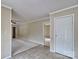 Bright living room with tile entry flowing into carpet, providing a cozy and welcoming space at 1774 Wintertide Rd, Jefferson, SC 29718