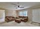 Comfortable living room with plush sofas, ceiling fan, and a view of the front door at 1774 Wintertide Rd, Jefferson, SC 29718