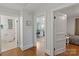 Hallway with access to bathroom, office and bedroom, hardwood floors at 1933 Thurmond Pl, Charlotte, NC 28205