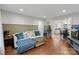 Spacious living room showcasing hardwood floors and open floor plan to kitchen at 1933 Thurmond Pl, Charlotte, NC 28205