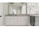 A bright bathroom with granite countertops, double vanity, and a large walk-in shower at 1963 Felts Pkwy, Fort Mill, SC 29715