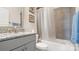 A functional bathroom with a granite countertop vanity, and shower-tub combo at 1963 Felts Pkwy, Fort Mill, SC 29715