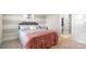 Comfortable bedroom boasts soft carpet, and an ensuite bathroom for convenience at 1963 Felts Pkwy, Fort Mill, SC 29715