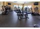 A well-equipped gym with treadmills, stationary bikes, elliptical machines and weight training equipment at 1963 Felts Pkwy, Fort Mill, SC 29715