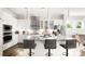 Beautiful kitchen featuring a large island, sleek countertops, and modern pendant lighting at 1963 Felts Pkwy, Fort Mill, SC 29715