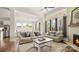 Open-concept living space connecting living room and dining area, filled with natural light at 1963 Felts Pkwy, Fort Mill, SC 29715