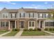 Charming townhomes showcase stone accents, manicured lawns, and inviting entryways, creating an appealing curb presence at 2037 Birchside Dr, Charlotte, NC 28205
