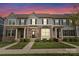 Charming townhomes showcase stone accents, manicured lawns, and inviting entryways, creating an appealing curb presence at 2037 Birchside Dr, Charlotte, NC 28205