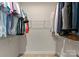 Spacious walk-in closet featuring wire shelving for ample storage and organization of clothes and accessories at 2037 Birchside Dr, Charlotte, NC 28205