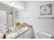 Clean, bright bathroom featuring double sinks and granite countertops at 205 E Maine Ave, Bessemer City, NC 28016