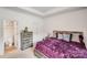 Bedroom with tray ceiling, neutral walls, and cozy bed with pillows at 205 E Maine Ave, Bessemer City, NC 28016