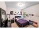 Cozy bedroom filled with decor, posters, and a window view at 205 E Maine Ave, Bessemer City, NC 28016