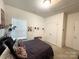Neutral bedroom with double closets, carpet and window providing natural light at 205 E Maine Ave, Bessemer City, NC 28016