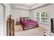 Comfortable bedroom featuring neutral walls, plush carpet, and a cozy bed at 205 E Maine Ave, Bessemer City, NC 28016