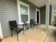Inviting front porch with chairs, perfect for enjoying the outdoors at 205 E Maine Ave, Bessemer City, NC 28016