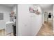 Laundry room with washer, dryer, shelving and decor on the walls at 205 E Maine Ave, Bessemer City, NC 28016