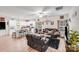 Inviting open-concept living room and kitchen featuring hardwood floors and lots of natural light at 205 E Maine Ave, Bessemer City, NC 28016